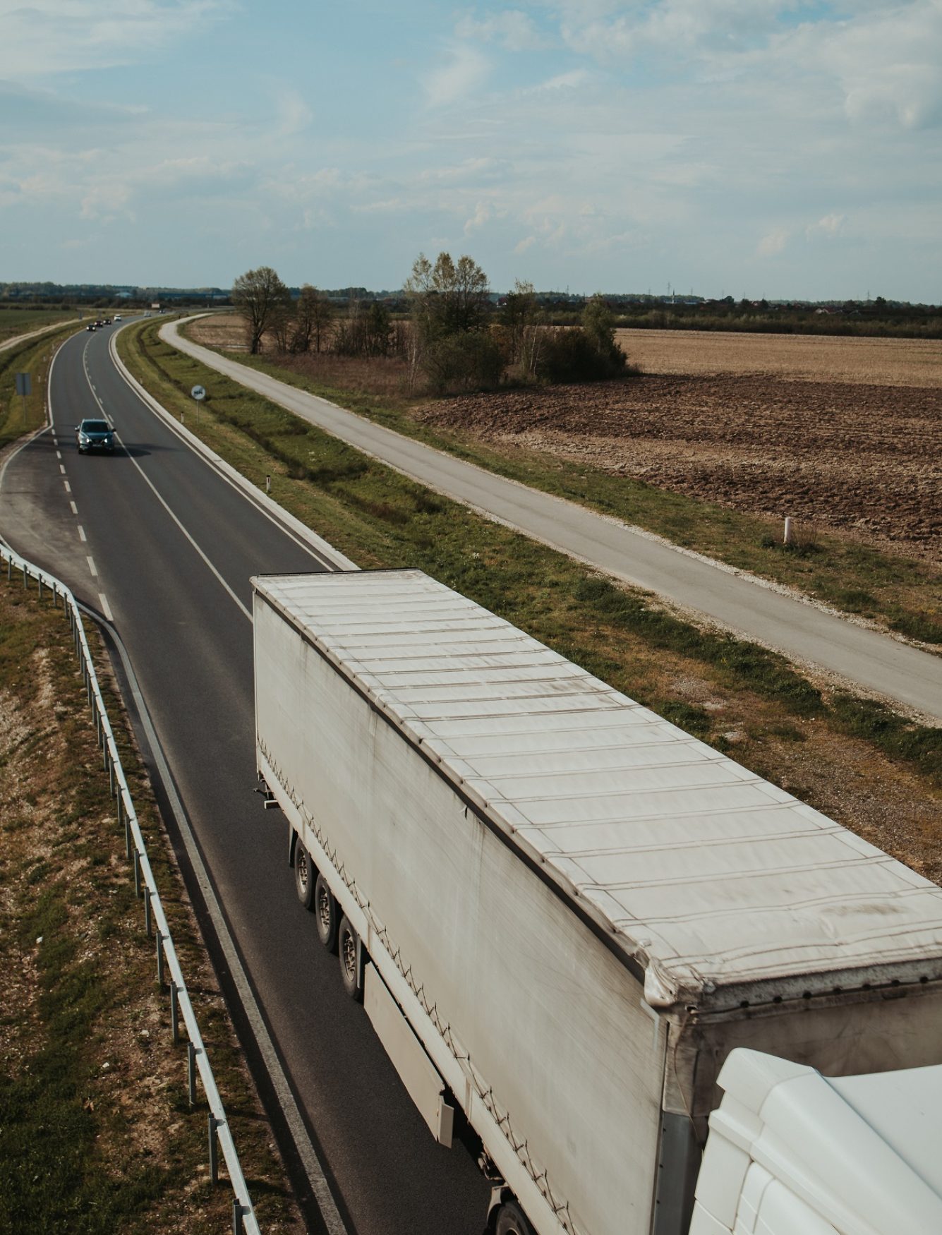 A white truck on a highway